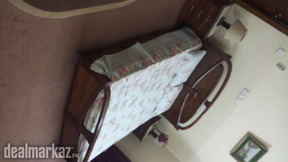 Wooden Double bed with two side tables.condition is good