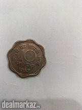 Coin of 10 paisas of India 1957