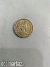 A very thick coin of one pound of united kingdom,1983