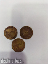 A Pakistani brass coin of one paisa, 3 pieces,1956,1957,1958