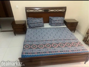 Bed with two side tables