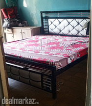 Queen-size bed with mattress