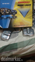 Suzuki car door logo light