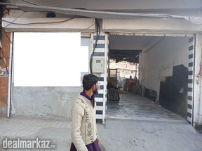 Main Ghazi road premium location for business and bank place for sale